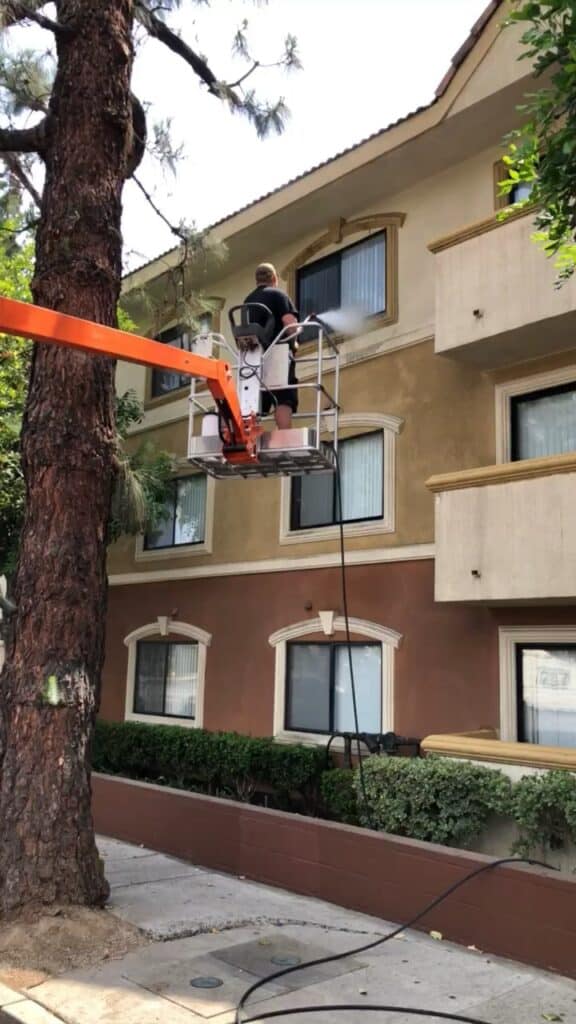 Our staff does the pressure washing services for this residential building window washing in West Hollywood.