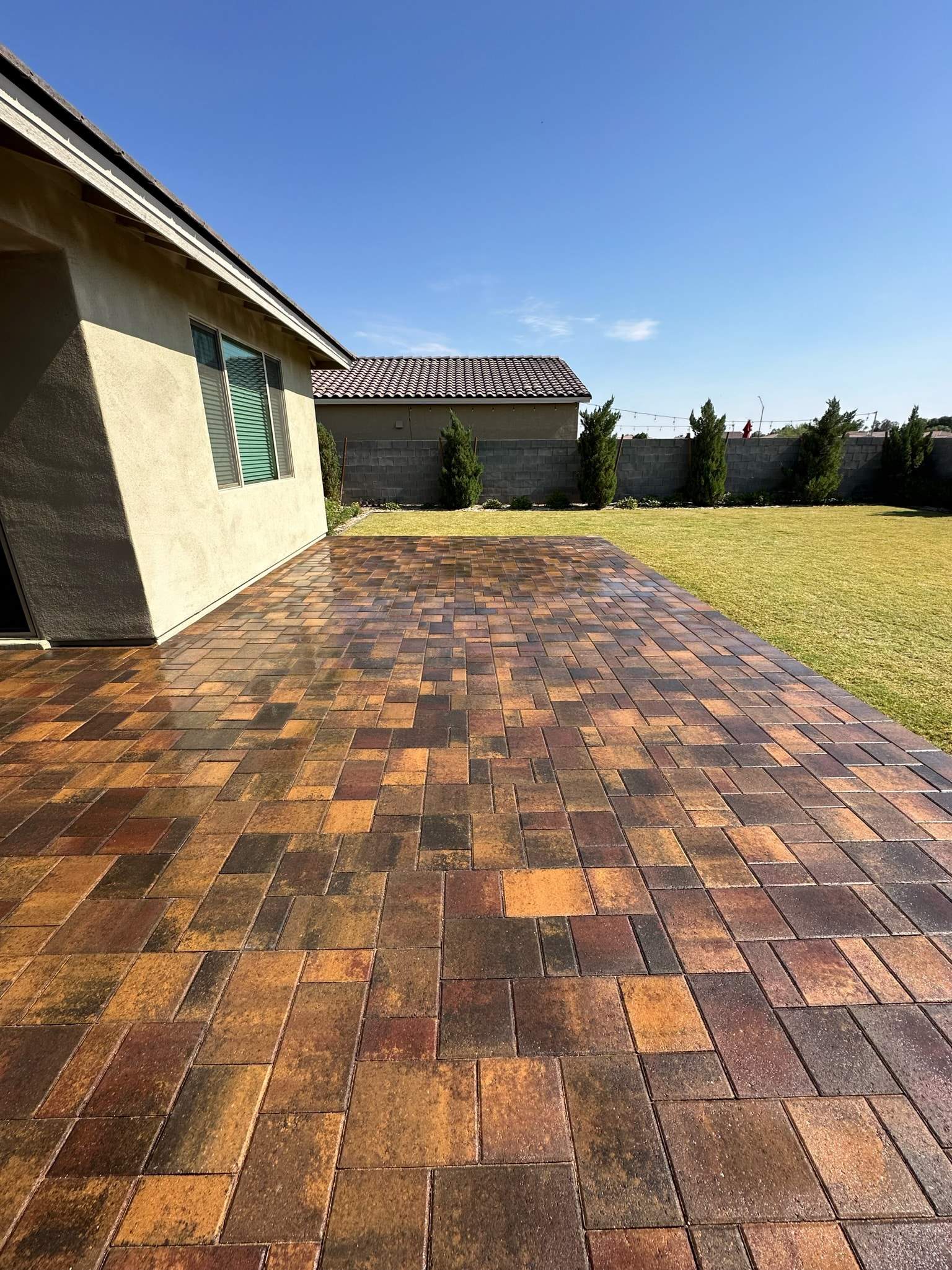 post brick cleaning, a shiny floor in the patio of a home